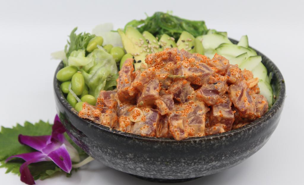 Spicy Ahi Tuna Salad Bowl · Choice of protein with salad base, pickled cucumber, avocado, carrot, red cabbage, edamame, sweet corn and seaweed salad. Contains raw fish.