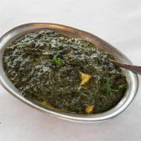 46. Mild Palak Paneer · Delicately flavored spinach cooked with fresh homemade cottage cheese, garnished with choppe...