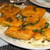 6 Pieces Paneer Pakoras · Homemade cheese, deep fried in lightly spiced chickpea batter.