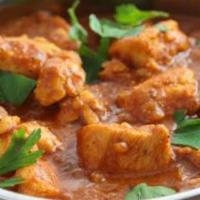 Chicken Curry · Boneless chicken cooked in a sauce made of onions, garlic, ginger and spices. Gluten Free. S...