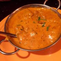 Lamb Boti Masala · Boneless lamb barbecued in tandoori oven, then cooked with onions, cream and spices. Served ...