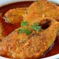 Fish Curry · Boneless pieces of salmon cooked in a sauce made of onions, garlic, ginger and spices. Glute...