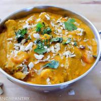 Vegetable Korma · Vegetables cooked with onions, tomatoes, cashews, cream and spices. Served with rice. Vegeta...