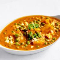 Matter Paneer · Homemade cheese and tender peas cooked in mildly spiced gravy. Served with rice. Vegetarian.