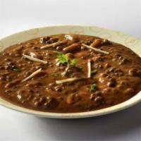 Daal Makhani · Lentils cooked with onions, ginger, garlic, tomatoes and butter. Served with rice. Vegetarian.