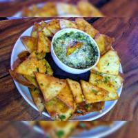 Spinach & Artichoke Dip · Served with house made tortilla chips