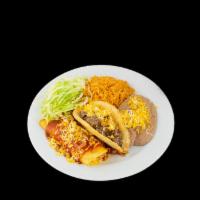6. Shredded Beef Taco and Enchilada Combination Plate · One hard shell beef taco with cheese and lettuce on top. One cheese enchilada smothered with...