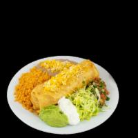 8. Chimichanga Combination Plate · Fried burrito, with your choice of chicken or beef with beans and cheese inside the burrito,...