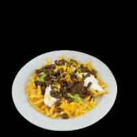Carne Asada Fries · French fries served with cheese, guacamole, and sour cream with your choice of meat.