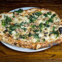 Salsiccia e Friarielli Pizza · Italian sausage, broccoli rabe, smoked mozzarella, basil and extra virgin olive oil.