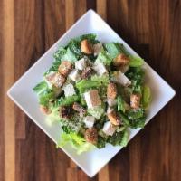 Chicken Caesar Salad · Romaine Lettuce, Chicken, Parmigiano & Croutons