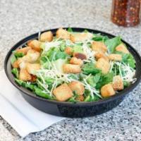 Caesar Salad · Hearts of romaine topped with toasted seasoned croutons and shredded Parmesan cheese.