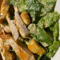Small Classic Caesar Salad · Crisp romaine tossed with our house-made dressing, Parmigiano, and seasoned croutons.