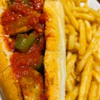 Sausage & Peppers Sandwich · Grilled sausage sauteed with green peppers and our delicious marinara on a fresh Italian rol...