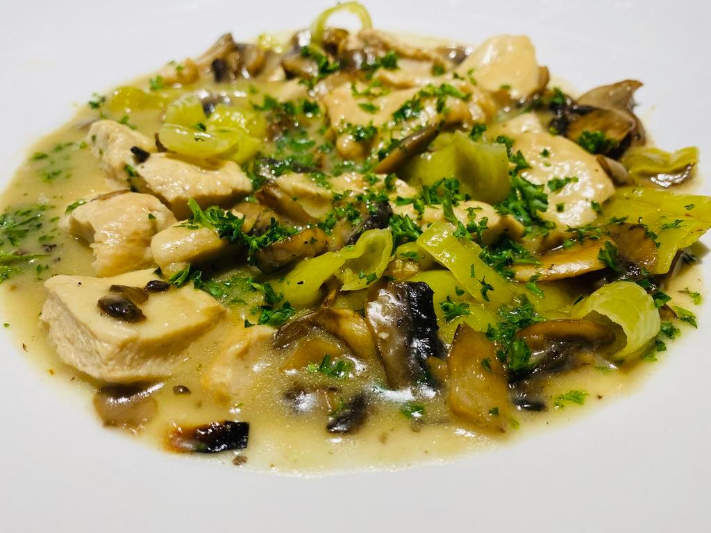 Chicken Scarpara · Tender chicken breast sauteed with garlic, mushrooms, and pepperoncini in lemon butter and white wine sauce served with penne marinara and broccoli.Your Choice of Soup or Salad & Garlic Bread.