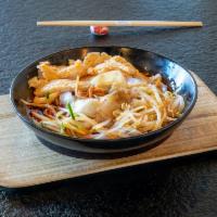 Sesame Liang Pi · Chewy wheat flour noodles tossed with vegetables and cubes of spongy gluten. Served with ses...