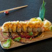 J’s Salmon Roll · Shrimp tempura, crab meat, cream cheese, topped with baked salmon, masago, tempura flakes, s...