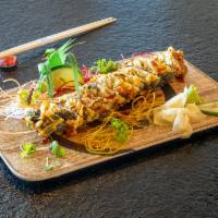 JB Tempura Roll · Delicately fried salmon, cream cheese, and scallions topped with eel sauce.