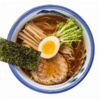 Yuzu Shoyu Ramen · Shoyu tare, chicken broth, yuzu, bamboo shoots, egg, chashu pork, endive, fried garlic, nori.