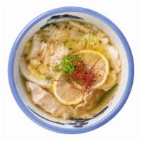 Gyoza Soup · Pork, green onion, ginger, garlic, cabbage, chicken broth, sesame, chili threads, lemon.