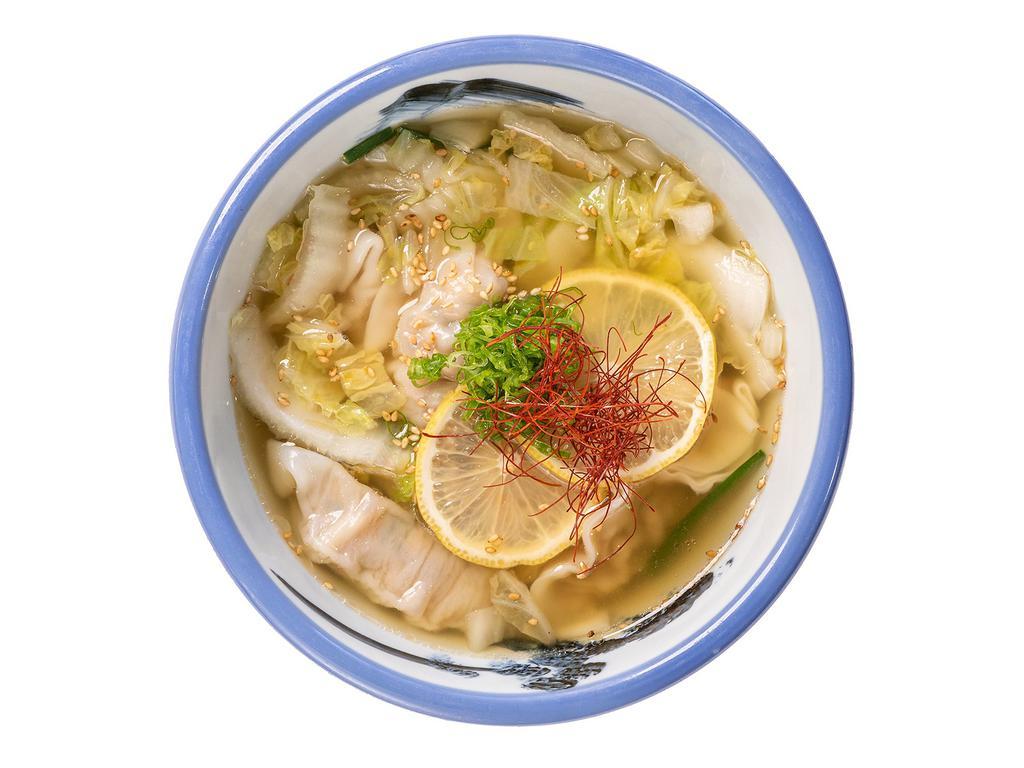 Gyoza Soup · Pork, green onion, ginger, garlic, cabbage, chicken broth, sesame, chili threads, lemon.