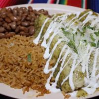 Cheese Enchilada · Filled with Mexican Monterey jack cheese. Three soft corn tortillas smothered with your choi...