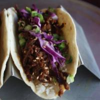 19. Bulgogi Beef · Asia. Sliced beef, rice, red cabbage, green onions, sesame seed.