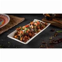 Paradise Chicken Chaat · Boneless chicken pieces lightly tossed in creamy Butter Sauce, topped with fresh channa, yog...
