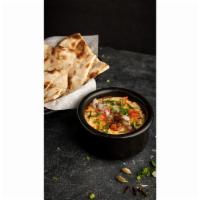 Hommus & Naan · House-made Hommus speciality from with fresh channa (chickpeas), tahini paste, olive oil, an...