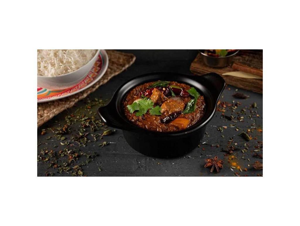 Hyderabad Lamb Curry · Tender lamb pieces cooked in savory kadai masala made from whole ground spices, tomato, onion, bell pepper in rich onion gravy
