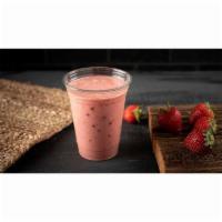 Strawberry-fruit Boba Lassi · Traditional yogurt-base smoothie made fresh with real strawberry and bursting fruit boba
