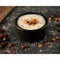 Rice Kheer · Classic Indian rice pudding made with Basmati rice, flavored with cardamom, saffron, golden ...