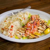 Stithos Kotas · Marinated grilled chicken breast. Served with Greek salad or soup and choice of rice, lemon ...