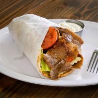 Gyro Wrap · Vertically roasted spiced minced beef and lamb. Served with lettuce, tomato, onions and tzat...