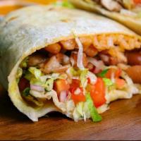 Classic Burrito · Flour tortilla, choice of vegan meat, beans, rice, pico and lettuce.