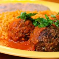 Albondigas Plate · 3 albondigas (made with Beyond meat) in mild chipotle sauce. Served with rice, beans and cor...
