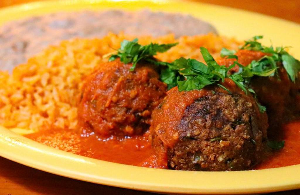 Albondigas Plate · 3 albondigas (made with Beyond meat) in mild chipotle sauce. Served with rice, beans and corn tortillas. Gluten free.