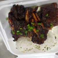4. Kalbi Beef Short Ribs · Grilled beef short ribs. Includes furikake rice and side of mac salad.