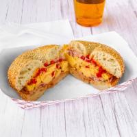 Cottons Bagel Sandwich · Eggs, onion, bell peppers, ham and melted pepper jack cheese.