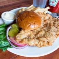 Tenderloin Sandwich · Served breaded or grilled along with lettuce, tomato, onion, pickles and a side of mayo.