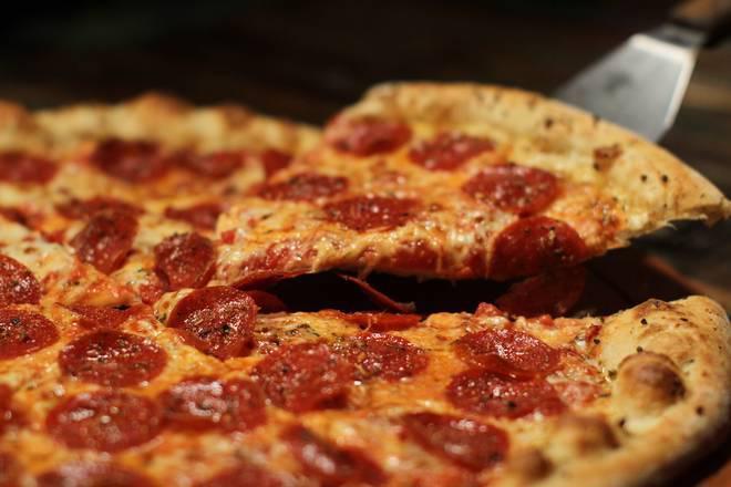 Whole: Plain Ass Pepperoni · A generous layer of Pepperoni, sprinkled with Parmesan Cheese.