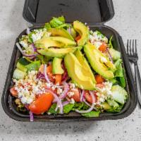 Avocado Salad · Crisp romaine lettuce, spring mix, cucumbers, tomatoes, red onion, avocado and feta cheese. ...