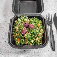 Tabouleh Salad · Finely chopped fresh parsley, diced tomatoes and onion dressed with lemon and olive oil. Veg...