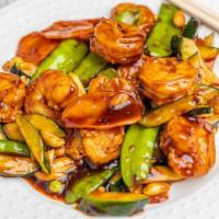 24. Kung Pao Shrimp · Szechuan style lightly breaded shrimp, jumbo shrimp with zucchini, carrot and snowpeas and t...