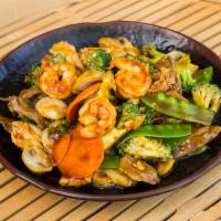 Happy Family · Chicken, beef and shrimp sauteed with broccoli, carrots, snow peas imitation crab and mushro...
