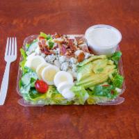 Classic Cobb Salad Meal · Romaine, chicken, bacon, sliced boiled egg, cucumbers, bleu cheese crumbles, avocado, and ch...