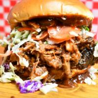 2. Pork & Slaw · Chopped pork with house-made vinegar cabbage coleslaw