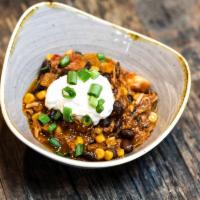 32 oz Chili · Sweeter side with a hint of spice topped with sour cream and green onions
