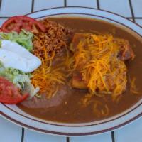 C6. Chicken Chimichanga Combo · Served with green Chile, onions, sprinkled cheese and sour cream. Served with beans and rice.