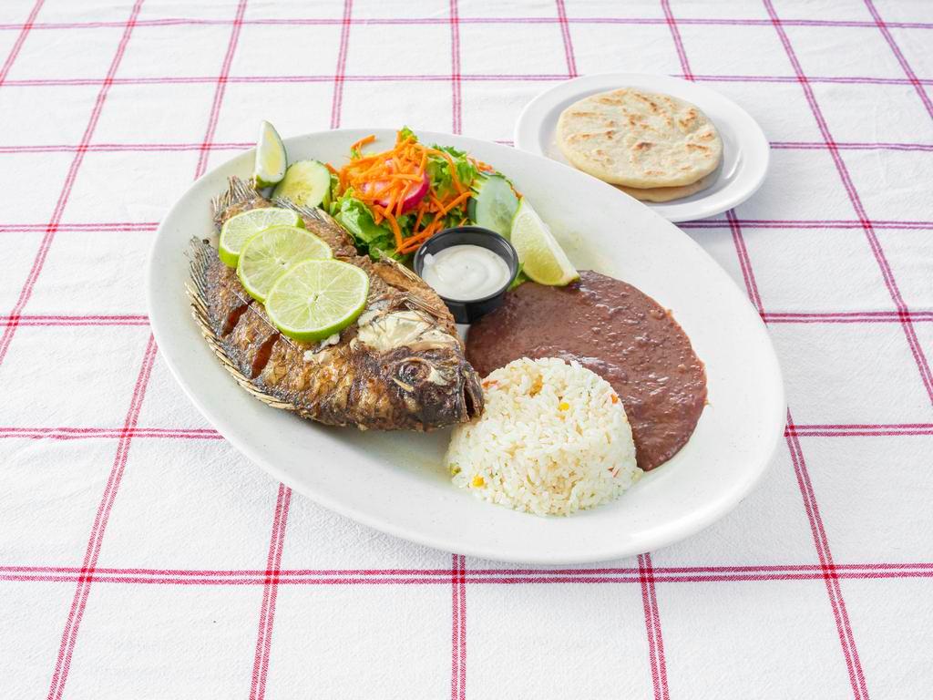Pescado Frito Dinner  · Large whole tilapia fish marinated in spices and deep-fried.
